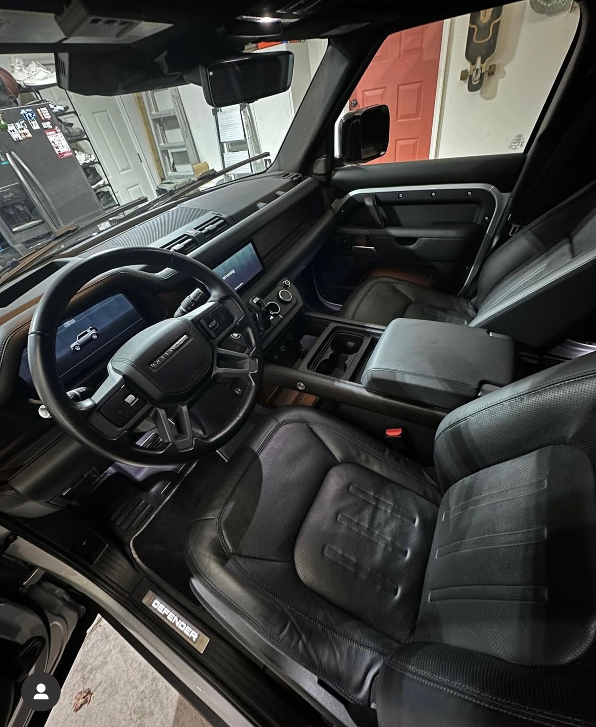 Vehicle interior before deep clean — front seats heavily soiled